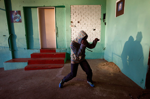 Johannesburg, South Africa: A boxer shadowboxes at the Hillbrow boxing gym | Kim Ludbrook/EPA