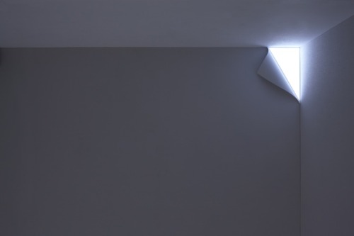 myedol:  Peel by YOY I love this so much. To put it simply this is just a wall mounted lamp, however it creates a wonderful illusion that the wall paper is peeling away from the surface. The bright illumination given off makes it look as if you’re peeling