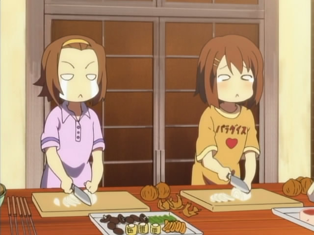 マ