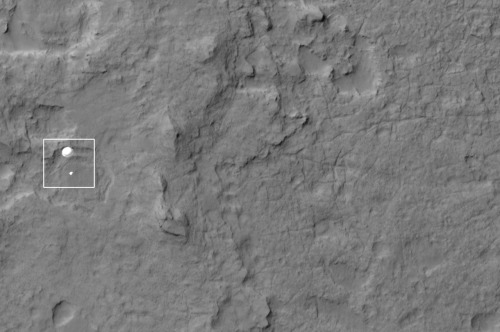 Curiosity on its descent to the Martian surface, taken by a satellite orbiting Mars.