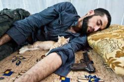 syrianfreedomls:  06/08/2012 Aleppo, #Syria: Hussam Armanazi was a medical student in Germany who left everything and returned to his country to join the FSA.. He was killed in Aleppo on 31/7/2012.. Photos of him with his constant companion the kitten