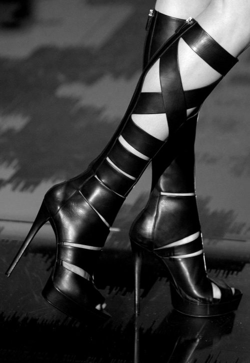 Dominatrix-style boots by Gucci porn pictures