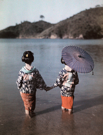 collective-history:  Two carefully coiffed friends brave the sea—and one, without parasol, the