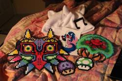 rawrcharlierawr:  This is some shit that some guy gave me, because he owed me for horse porn.The hat and little Vinyl Scratch pic are from BroNYcon, which he was at when I did his commissions. We had agreed to pay half in perler beads and half cash, but,