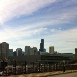 Taking pics while driving. #mycity #nofilter #instaphoto #tallbuildings #skyline #clouds #niceday (Taken with Instagram)