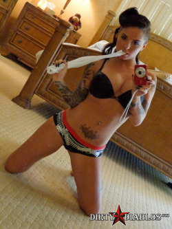 dirtydiablos:  Hot pic of Christy Mack in the mirror posing with her big boobs in her panties and bra. Click on the pic to see more. 