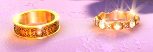 wishingonapplesandrightwardstars:  prince-fitzherbert:  OOC: Since I had never really seen a picture of Rapunzel and Eugene’s wedding rings close up, I decided to find a high quality picture and zoom up on them. Anyway, I cropped a picture and saved