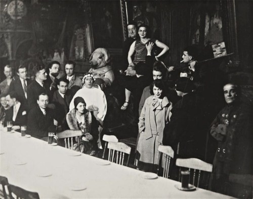 etund:  Cabaret du Ciel, 1927. Photo by Man Ray. Standing: Hans Arp, Jean Caupenne, Georges Sadoul, 