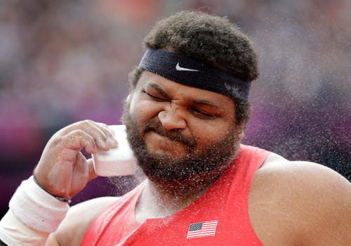 More pictures added to our ‘weird world’ of the Olympics: Dude with an enormous comb. He