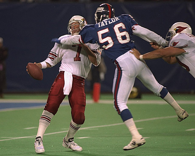 Lawrence Taylor sacks Steve Beuerlein during a 1993 Giants-Cardinals game.  New York takes on Jackso…