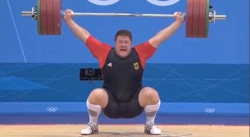 Defending Gold Medalist, German weightlifter Matthias Steiner drops 432-pound barbell on his head, w