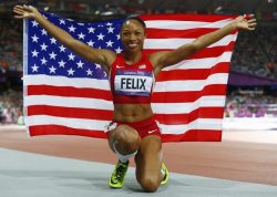 does-what-a-spider-can:  Allyson Felix is the first athlete in history to win the gold in the 100, 200 and 400 meter race.  #blackexecellence 