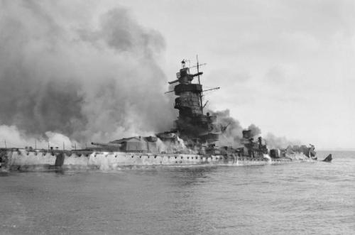 collective-history:The German battleship Admiral Graf Spee in flames after being scuttled in the Riv