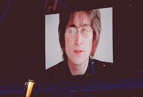 Porn Pics ghoddos:  John Lennon is displayed on a screen