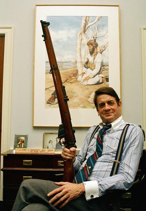 peashooter85:Congressman Charlie Wilson poses with a Lee Enfield Rifle.  Known for championing the c