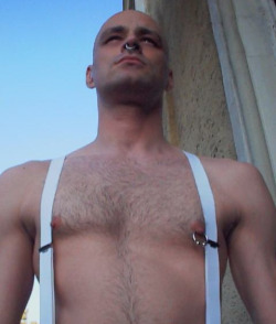 Nipples and suspenders. With a nipple ring