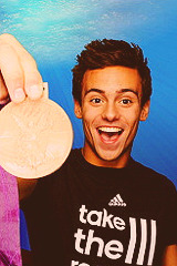 oliviergiroudd:  Tom Daley with his bronze medal in the Adidas photobooth 