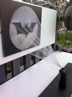 Batsignal string art