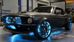 shroudedinmystery:  626thrower626:  Microsoft, together with West Coast Customs, have put together an unusual creation: A 2012 Ford Mustang, albeit with a 1967 replica body in a matte black finish, and as much Microsoft-powered tech as possible.  This