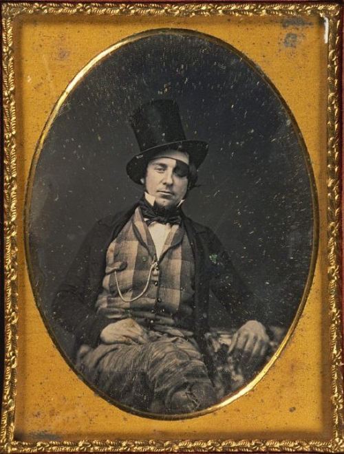 tuesday-johnson: ca. 1840-60, [daguerreotype portrait of a gentleman wearing top hat and patch over 