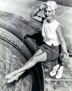 A Press Photo From October Of ‘63 Features Tania Dawn Cooling Her Feet During A