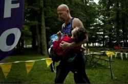 kilo-jericho-sierra:  mackoala:  This guy runs at a triathlon every year with his daughter. His daughter has cerebral palsy and he pulls her in a kayak during the swim, in a cart during bike and pushes her in a wheelchair for the run.  &lt;3 !