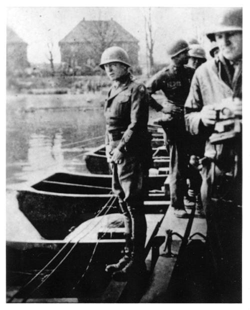 General George S. Patton stops to urinate in the Rhine River, March 1945.