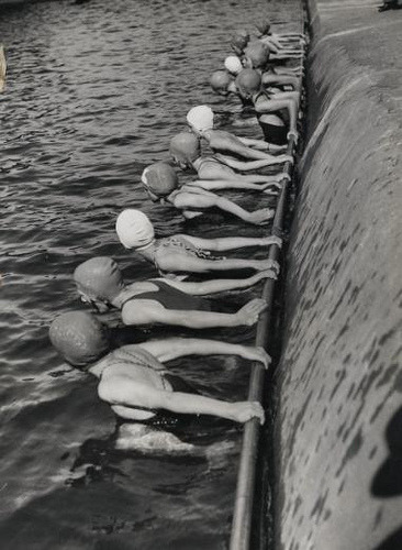 Swim caps galore, 1950s