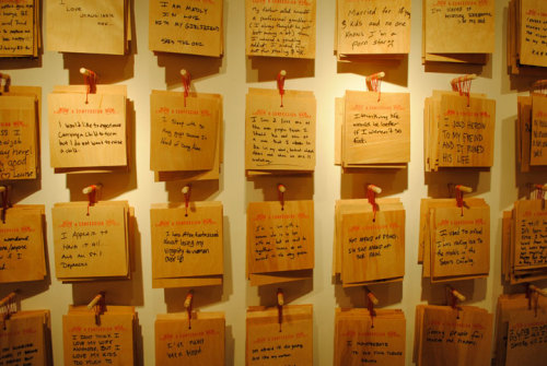  Confessions, public art project, The Cosmopolitan, Las Vegas, Nevada by Candy Chang. For one month, Chang lived in Vegas. Visitors could stop by, enter a booth, write whatever thoughts they wanted to share, and drop the confession into a box that mixed