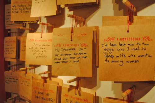  Confessions, public art project, The Cosmopolitan, Las Vegas, Nevada by Candy Chang. For one month, Chang lived in Vegas. Visitors could stop by, enter a booth, write whatever thoughts they wanted to share, and drop the confession into a box that mixed