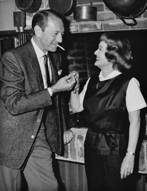 eccentricks:Bette Davis and Paul Henreid reenact their iconic cigarette-lighting scene from Now, Voy