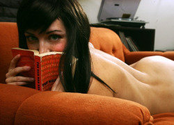goodlegs:  Reading is Sexy by Super Furry Librarian on Flickr.  you get to be my kind of girlfriend if I ask you to take sexy pictures with a book and you spend all day picking out the book.