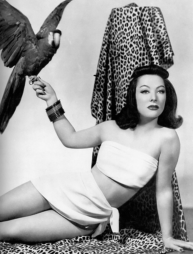 Vintage 50’s-era promo photo of Yvette Dare (and her Macaw: “Lippy”)..
