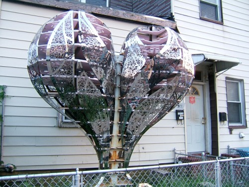 I love Long Island City from the gentrified waterfront that’s home to all manner of restaurants to the gantries to the grittier side near the Ravenswood Houses. That’s where I found this gigantic shiny ornate heart sitting in someone’s front yard...