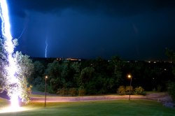 wbotd:  I had just come out of the basement after a tornado warning.There was alot of lightning so i figured i would shoot it out of my window.This was a 30 second exposure.The strike happened around 27 seconds into the shot.It was around 130-150 feet