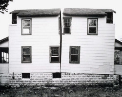 likeafieldmouse:  Gordon Matta-Clark - Splitting (1974) “Compelled to focus attention on the dehumanization of the modern world, Matta-Clark developed a personal idiom that combined Minimalism and Surrealism with urban architecture. Using abandoned