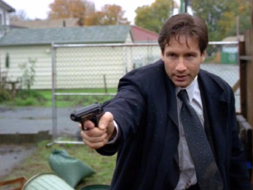 “I’m getting tired of losing my gun." Agent Fox Mulder pulls a backup Walther PPK f