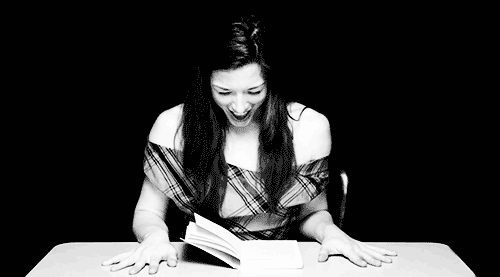 Excellent. Stoya tries to read a book aloud as a chick under the table uses a vibrator on her pussy. Adore that smile.
