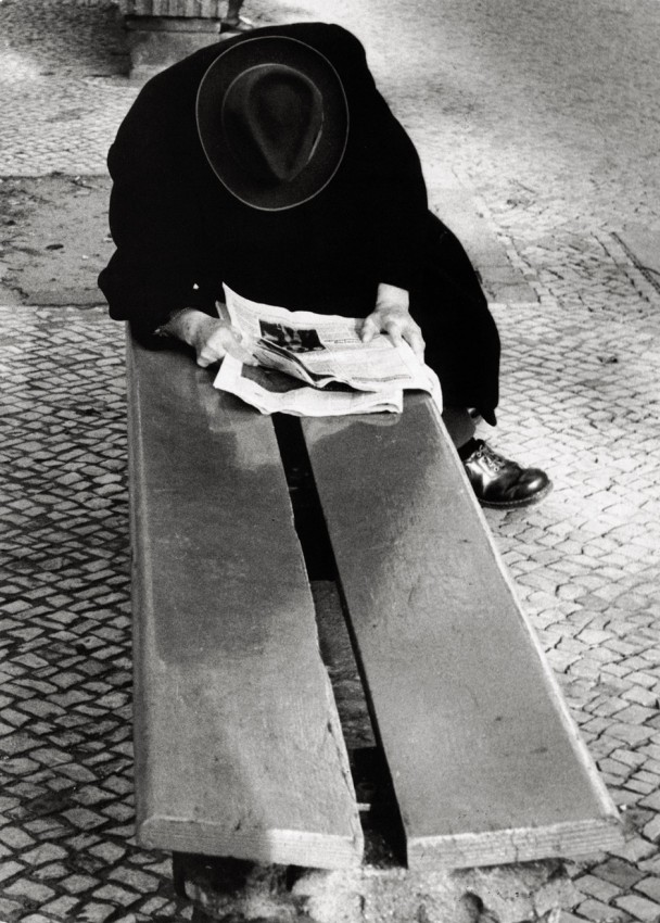 Gerhard Ullmann. Man reading on bench, 1960s.