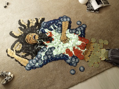 laughingsquid:
“Piracy, Musical Icon’s Mosaic Portraits Made from Their Own CDs
”
This looks incredible