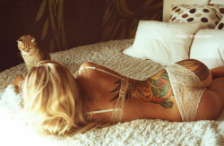 sexytattooedgirl:  Tattooed girl Maria Anohina http://tattooedgirlsmag.com/blonde-girl-eagle-tattoo-photography