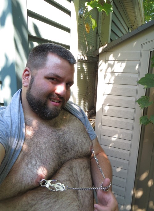 g4ym3r:  willcub:  Been wearing the cloverleaf clamps for a little while.  They hurt like hell, but they keep me leaking hard.  ;-) I went out back by the shed to get a shot of them.    its wierd that you can be hot and sexy… but then be adorable