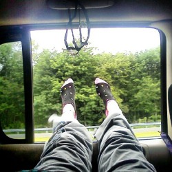 Feet hanging out the window, laying on my babys lap. :) (Taken with Instagram)