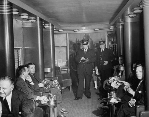 Interior of one of the club cars on the 20th Century Limited, the super luxurious all-Pullman rail line that ran between New York and Chicago, 1937.
