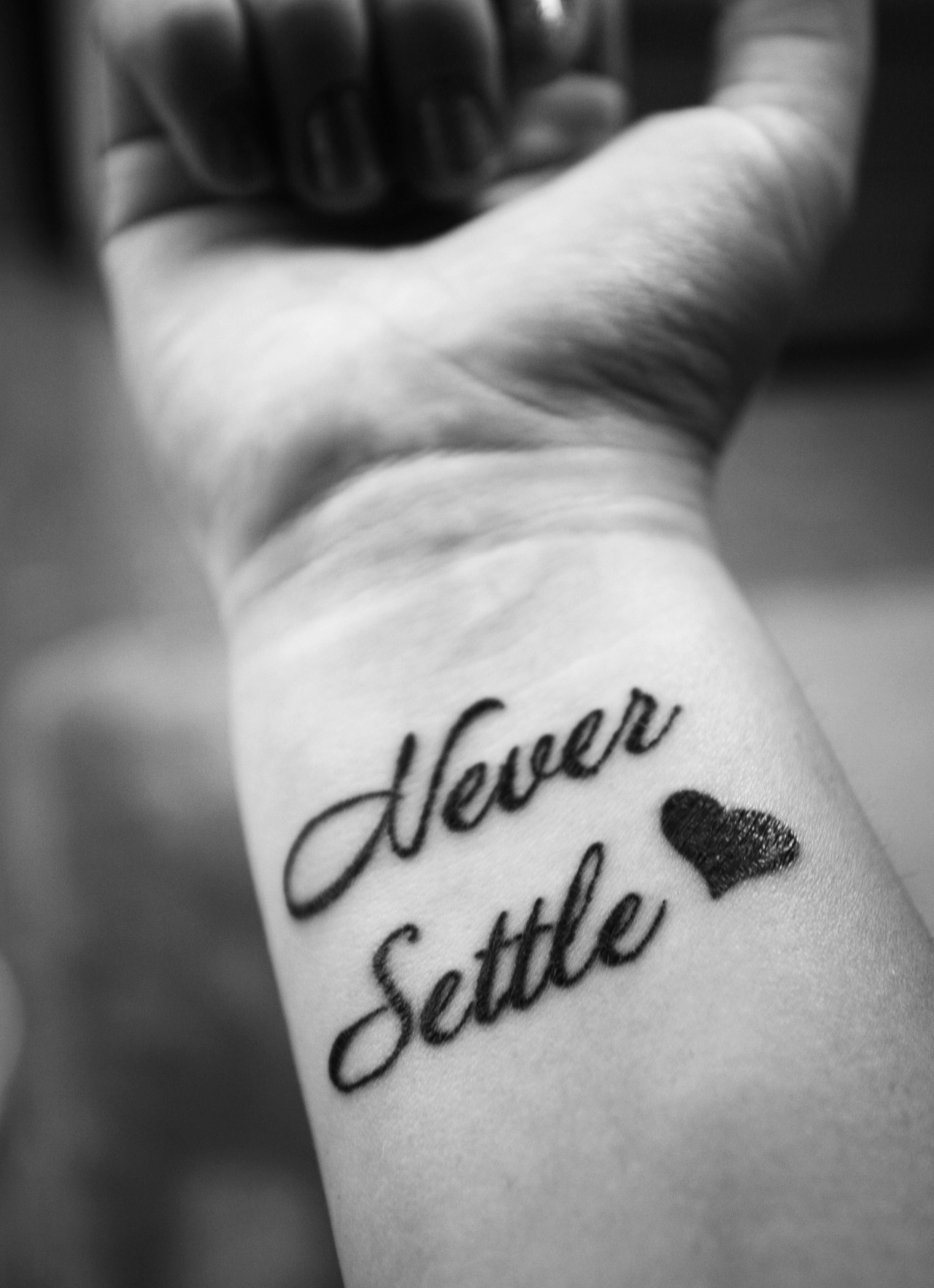 Just got Never Settle tattooed on my ring finger as a reminder to never  settle for the wrong guy  Tattoos Back tattoos Cute tattoos