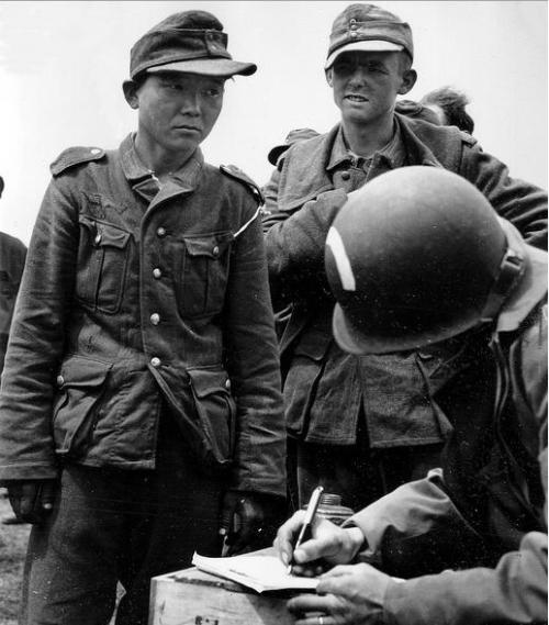 Korean laborers captured by Americans at Normandy.  The Koreans were laborers for the Japanese, but 