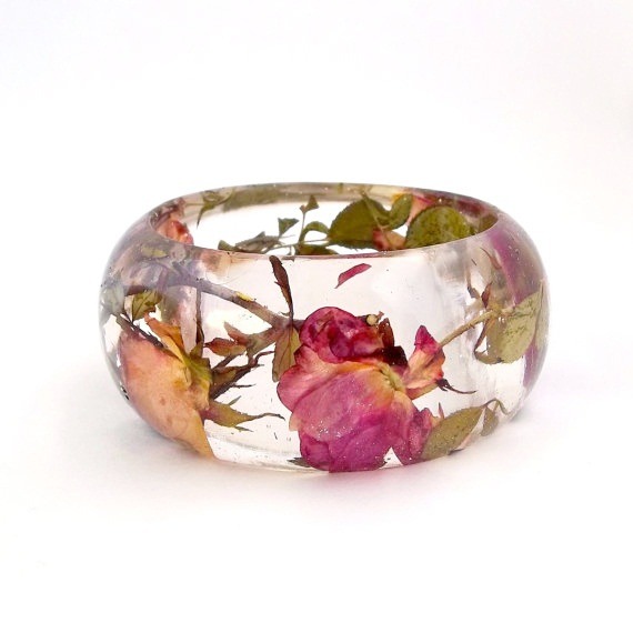 bookspaperscissors:  Handmade contemporary jewelry with resin and real flowers, made