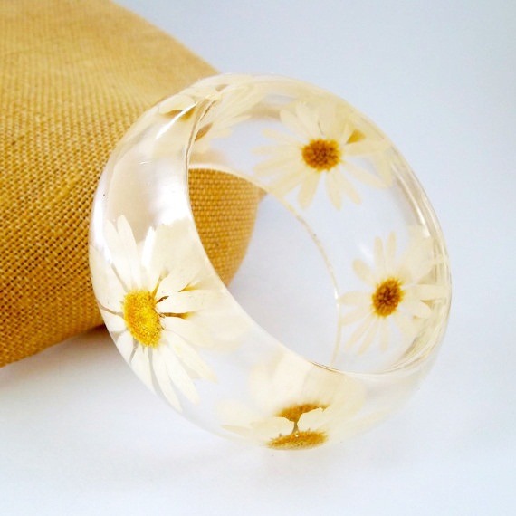 bookspaperscissors:  Handmade contemporary jewelry with resin and real flowers, made