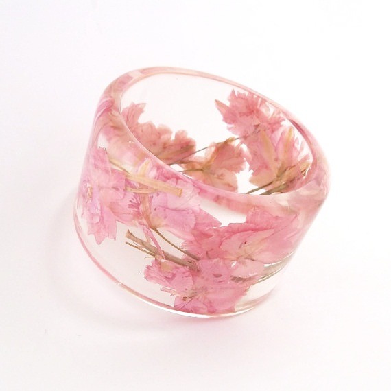 bookspaperscissors:  Handmade contemporary jewelry with resin and real flowers, made
