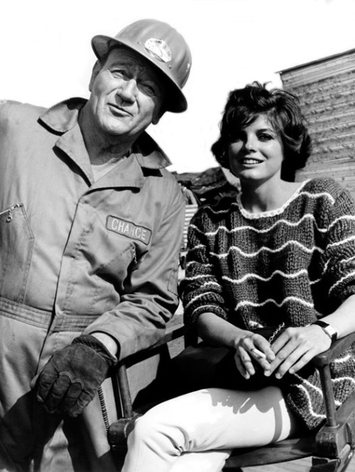 celluloidshadows:  Publicity photo of actors John Wayne and Katharine Ross from the set of the 1968 Andrew McLaglen film “Hellfighters”. Click the pic to watch a scene from the movie.